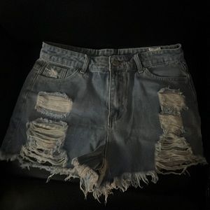 Size 30 blue Jean distressed shorts from Shein.